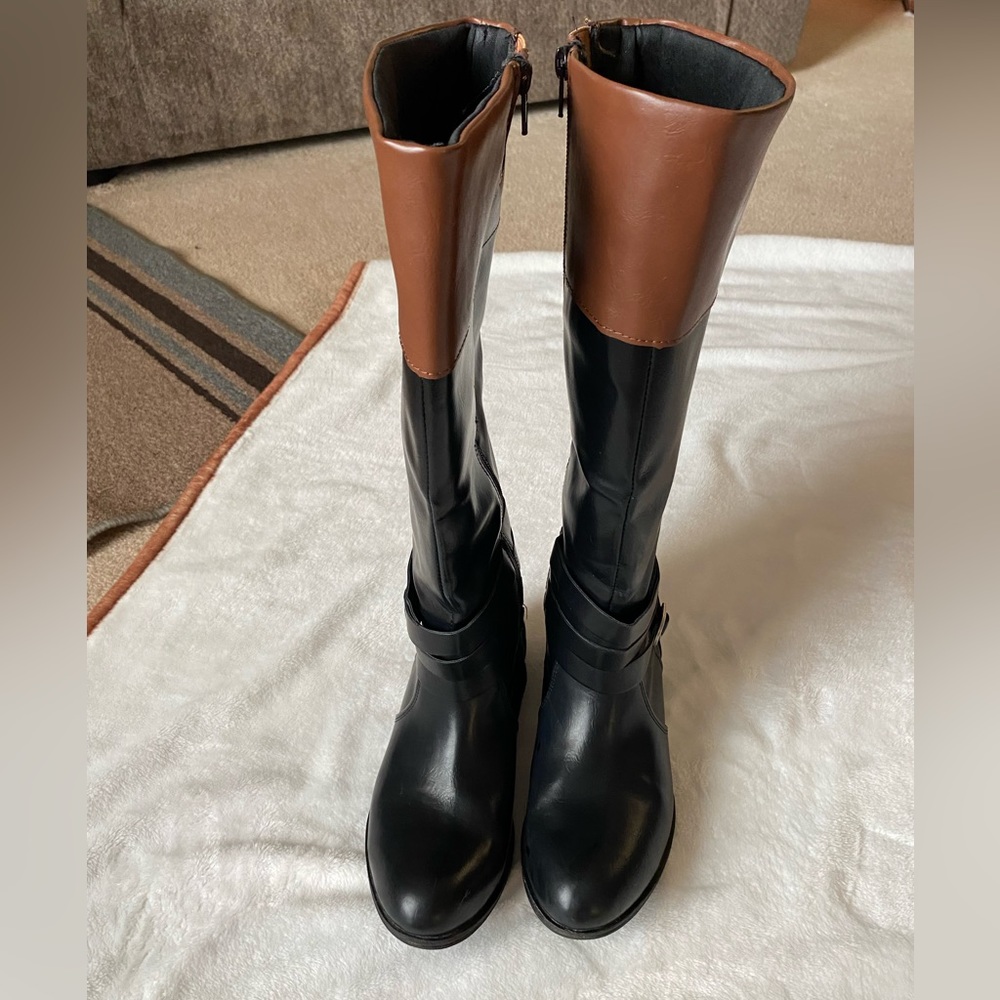 BlackTan high calf boots.